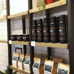 A merchandise wall at LOST Coffee, a Colorado small business