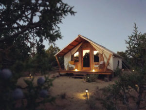 The front exterior of a desert-style glamping tent