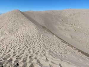 A massive sand dune in Great Sand Dunes, one of the best national parks in Colorado