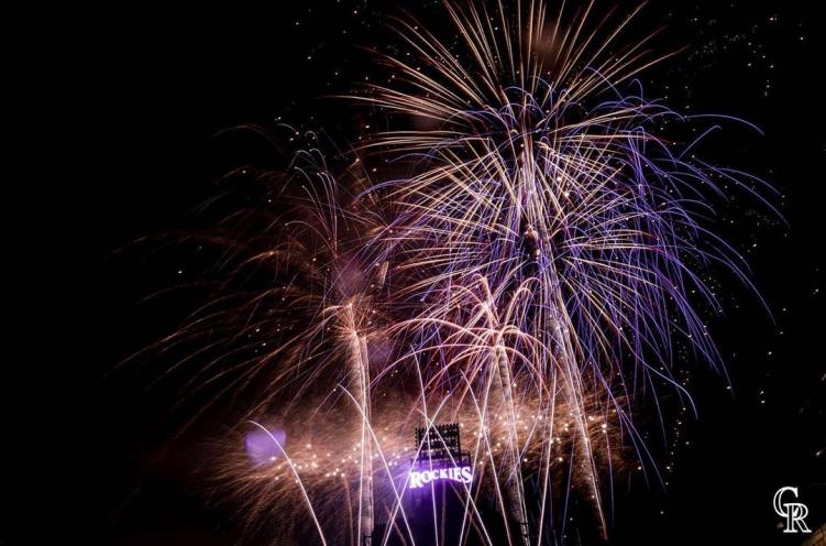 Fireworks in the night sky over Coors Field to celebrate Denver 4th of July