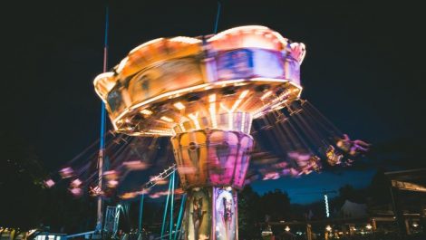 A ride lit up and spinning in Elitch Gardens, one of the bigger theme parks in Colorado