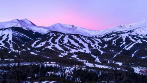A pink sunset behind Breckenridge during the Colorado ski season