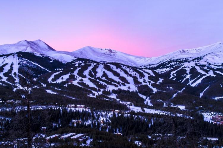 A pink sunset behind Breckenridge during the Colorado ski season